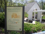 Picture of Flowing Well Park sign and shelter in Carmel, Indiana