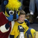 Pacers mascot Boomer with a young fan.