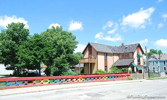 Photograph of the rainbow bridge leading to the Good Earth health food and apparel store in Broad Ripple Village