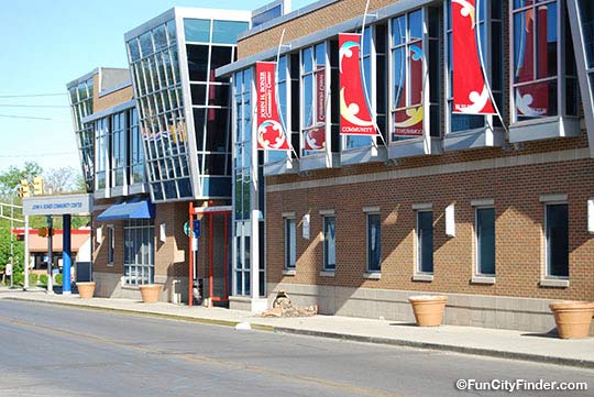 Photo of the John Boner Youth Center and colorful flags in downtown Indianapolis, Indiana