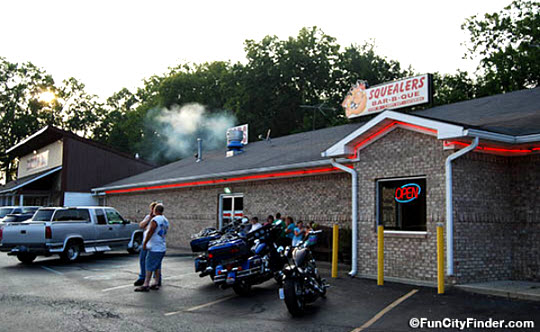 Parking lot entrance to Squealer's BBQ Restaurant in Mooresville, Indiana, southwest of Indianapolis